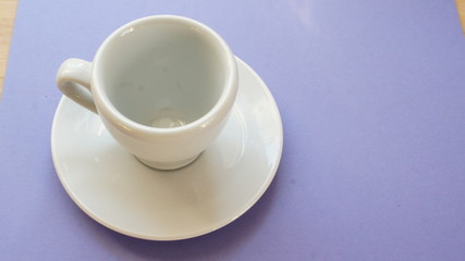 Obraz na płótnie Canvas cup of coffee, purple,cup, coffee, white, drink, isolated, tea, saucer, empty, mug, beverage, breakfast, plate, cafe, object, porcelain, food, espresso, ceramic, hot, dish, china, nobod