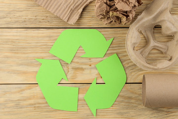 Eco symbol. recycling. eco concept on natural wooden table. waste recycling. view from above.