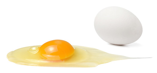 Whole egg and broken raw egg on white isolated background