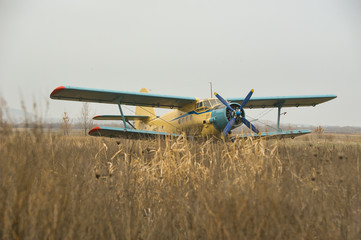 Biplane is in the field