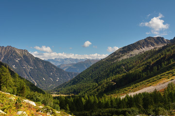 Fototapeta na wymiar Landscape with Swiss alpine mountains with glaciers and sunset.