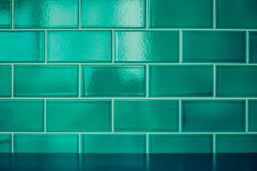 Green ceramic tiles wall background and texture.