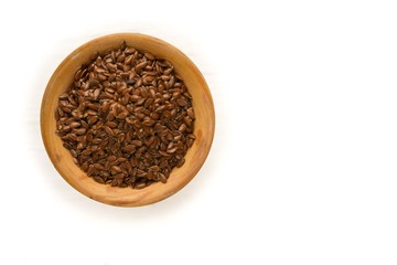 flax seed on white background,brown,food,wood,cup,health,organic,bowl,isolated,ingredient,dry,seeds,healthy,breakfast.