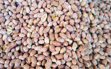 Top view of peanuts as background