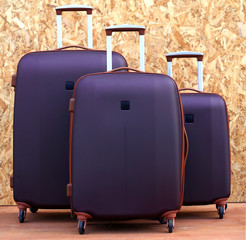 Close up trolly bag sets luggage  on texture background trolly bag.