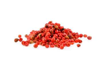 dried pink peppers isolated on white background