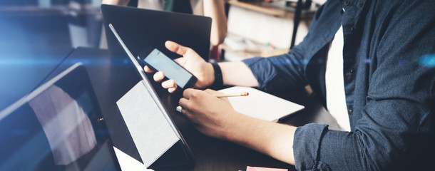 Business professionals using computer while spending time in the office. Closeup.