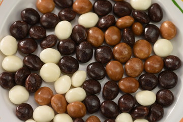  Dark ,white,brown dragee in chocolate cover. 