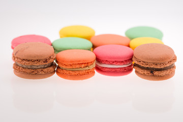 Multi-coloured macarons on white