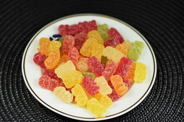 teddy gelatin,gummies,gummi bears on a porcelain plate