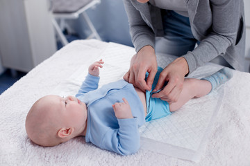 Replacing a dirty diaper with a clean one