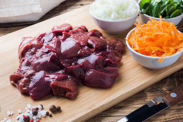 Raw chicken liver for cooking with vegetables.