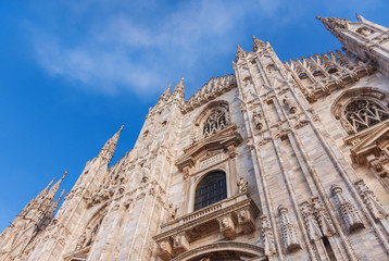 Fototapeta premium Beautiful Cathedral of the Nativity of St Mary gothic facade and pinnacles, the Milan city symbol