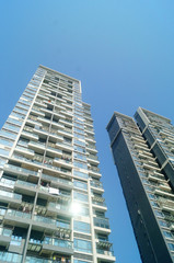 Fototapeta na wymiar The building appearance of urban residential buildings