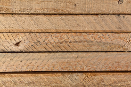 Several Rough Sawn Lumber Boards