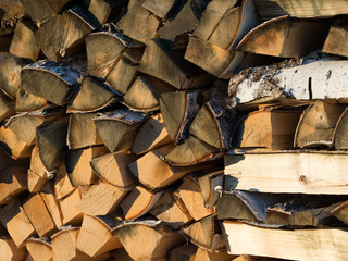 a lot of firewood prepared for winter