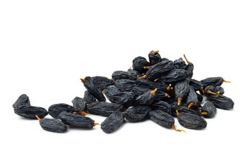 black raisins on white background