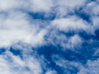 white clouds in the blue sky