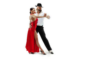 Portrait of young elegance tango dancers isolated over white background