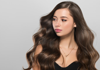 Fototapeta premium Beautiful long hair brunette woman with beauty hairstyle female model
