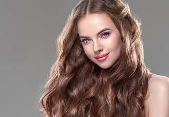 Fototapeta premium Beautiful long hair brunette woman with beauty hairstyle female model