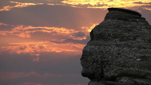 The Sphinx Rock (Sfinxul) in Bucegi Mountains Romania at sunset