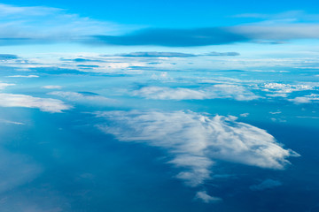 blue sky background with tiny clouds