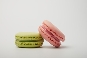 delicious dessert pastries French macaroons on white background