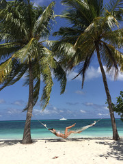 Sexy woman on tropical beach.