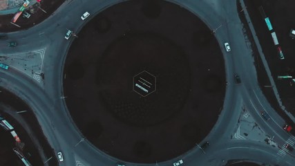 Aerial view to the road circle with city cars traffic 4k cinematic color, top view, Ternopil, Ukraine