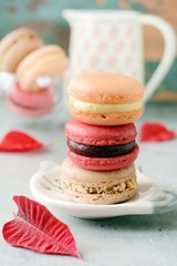 French Colorful Macarons Colorful Pastel Macarons. Small French cakes. Valentine's day concept. Romantic morning, gift for beloved. Breakfast on Valentin's, Mothers, Women's day.