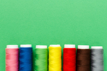 spool of thread on paper background