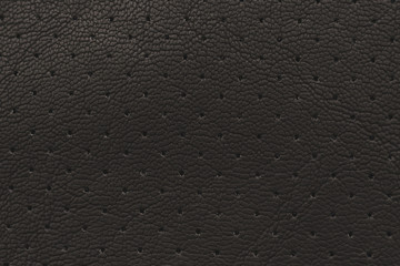 texture of leather material with holes