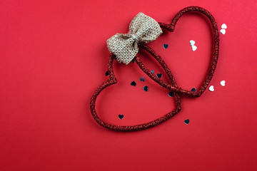Decorative hearts on a red background. 