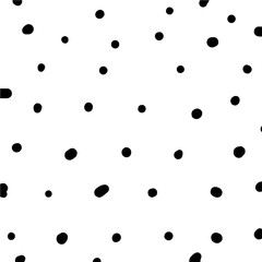 Simple hand drawn black and white pattern with brush ink dots