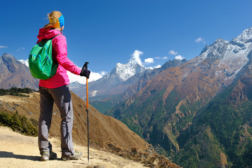 Hiker walking in the mountains, freedom and happiness, achievement in mountains. Himalayas, Everest Base Camp trek, Nepa