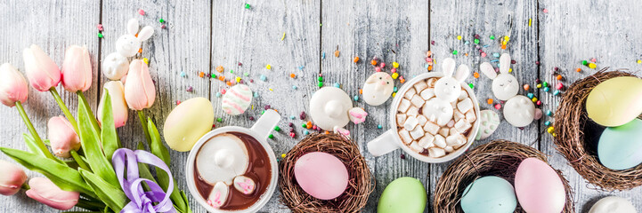 Easter funny kids food and drink concept, sweet hot chocolate with marshmallow bunny rabbits and...