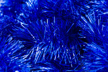 Blue tinsel closeup background texture
