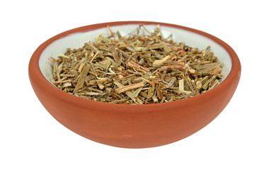 Side view of organic cut sheep sorrel in a bowl