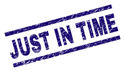 JUST IN TIME seal print with grunge style. Blue vector rubber print of JUST IN TIME label with retro texture. Text label is placed between parallel lines.