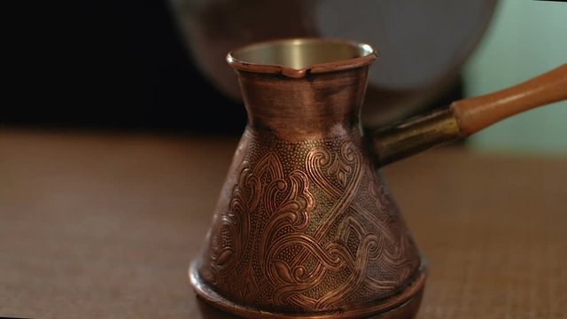 Traditional Turkish coffee. Copper Turk. Preparing black coffee. HD