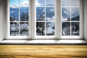 Plakat Table background and window of winter landscape 