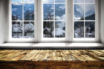 Table background and window of winter landscape 