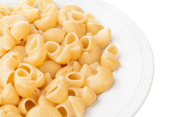 shell pasta in bowl, isolated on white background