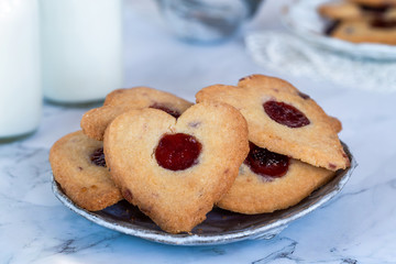 Shortbread hearts with cherry jam. Valentine food idea.