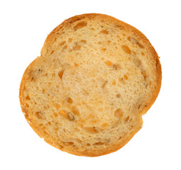 Top view of a single sesame round melba toast isolated on a white background.