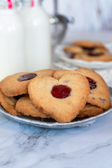 Shortbread hearts with cherry jam. Valentine food idea.