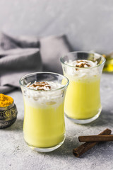 Turmeric whipped cream golden milk. Selective focus, space for text.