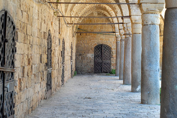 Obraz premium Colonnade at Khan al Umdan, Caravanserai in Acre, Israel