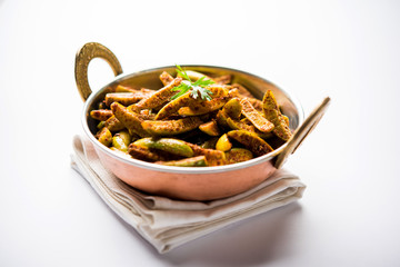 Tindora Sabzi / Tendli / tondli Fry also known as Ivy Gourd fry recipe. selective focus